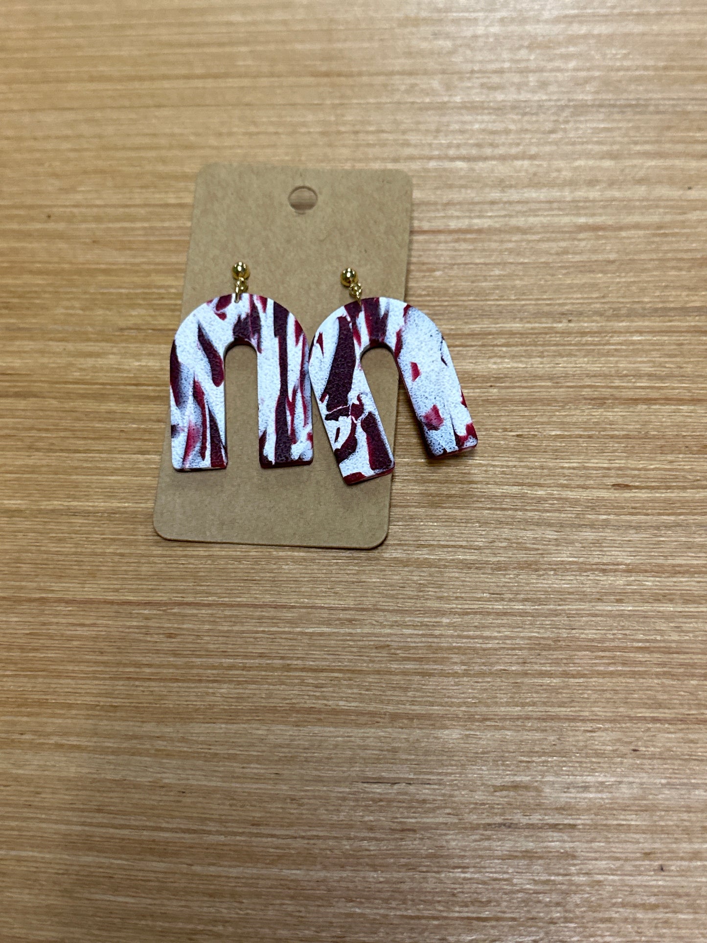 Maroon and white arches