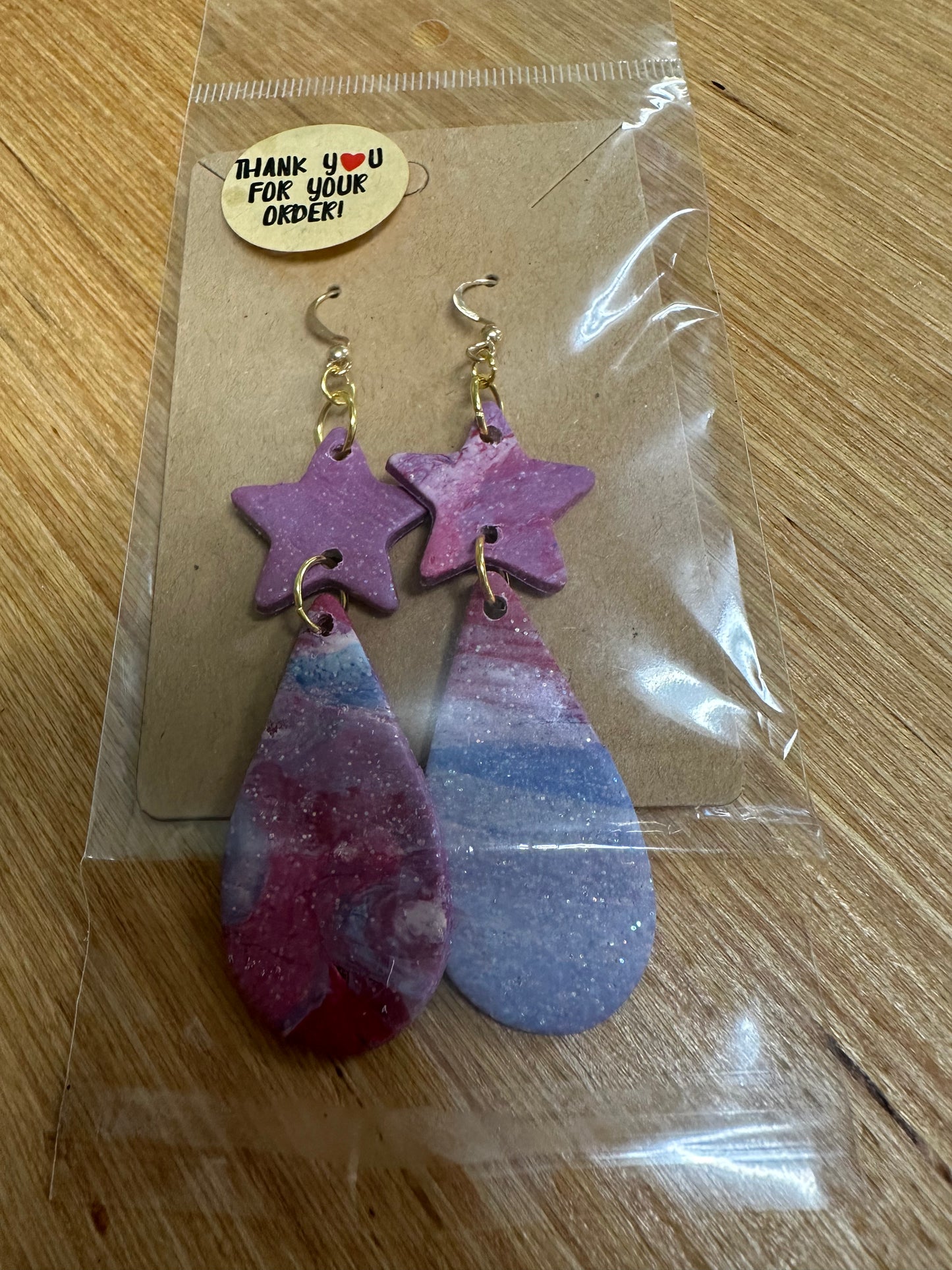 Clay earrings by J