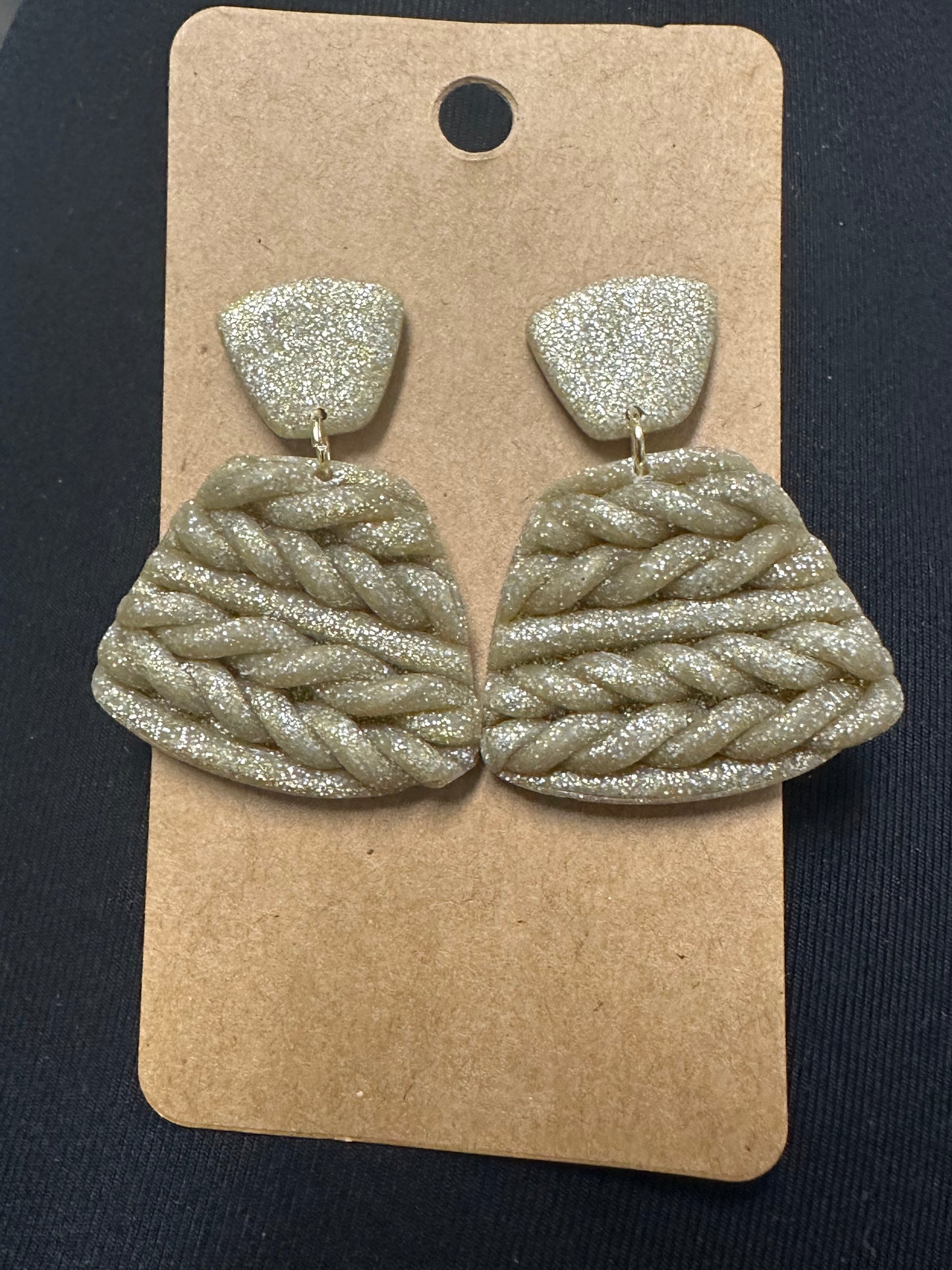 Gold twist dangle earrings